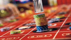 Sic Bo dice table at result lotto with multiple betting areas during esports event